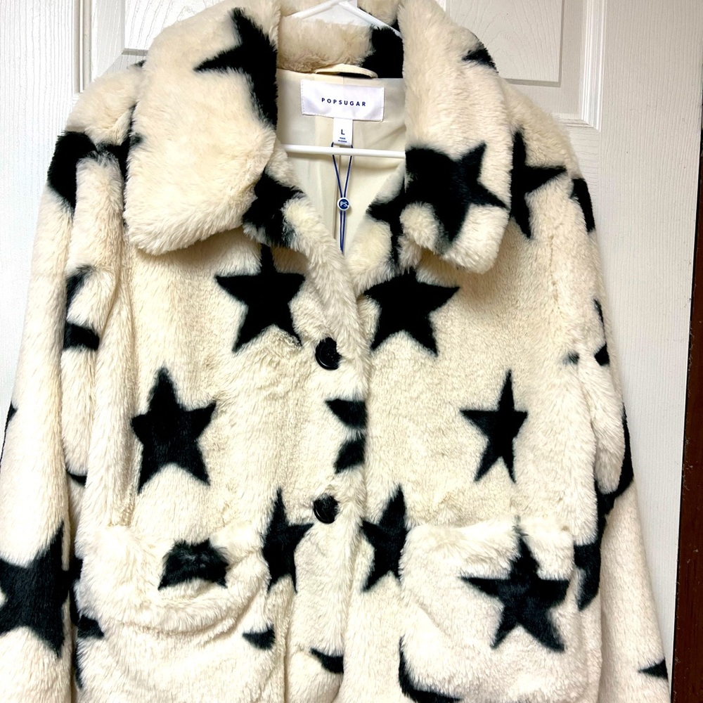 PopSugar coat. Off white with stars.